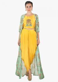 Yellow Crop Top Matched With Fancy Dhoti Pant And A Full Length Floral Jacket Only On Kalki Indian Gowns Dresses Indian Fashion Dresses Mehendi Outfits