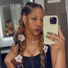 Cute …. Light … airy …. Perfect for this weather …. This was supposed to be  a bob but we just razored the ends a little instead because the curls were  sooo cute …