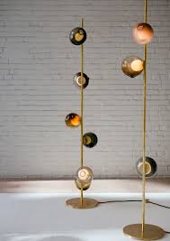 The result is a slightly distorted sphere with an interior landscape. 28 Series By Bocci Expands Into Stem Arms 28 Floor Bocci Floor Lamp Design Wall Lamp Design Funky Floor Lamps