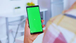 Wallpapers can be downloaded by android, apple iphone, samsung, nokia, sony, motorola, htc, micromax, huawei. Woman Watching Video Content On Phone With Green Screen In Kitchen Green Screen Chroma Mock Up Isolated Mockup Background Ready To Be Replaced With Your Text Logo Or Advertisement Using Internet Stock
