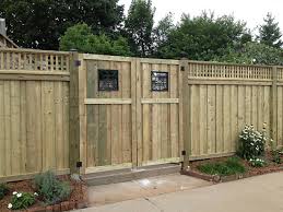 For a round post you can clamp on this. Fence Gate Photos Hamilton The Fence Guy