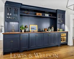 Kitchen creations is a family owned, full service kitchen and bath design company serving cape cod and southern massachusetts for more than 25 years. Classic Cape Cod Navy Wet Bar Custom Kitchens Cape Cod House Interior Kitchen Plans