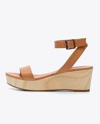 Finally An Elevated Wedge Sandal That Provides Both Comfort And Style The Sarita Wooden Wedge Is Proudly Handcra Women Shoes Wedge Sandals Leather Shoes Woman