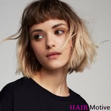 You can make it shorter in the back and longer in the front, with long bangs. 50 Short Layered Haircuts That Are Classy And Sassy Hair Motive