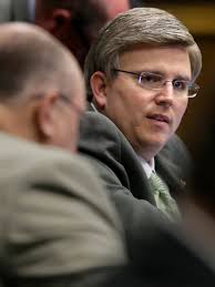 Lawmaker defends giving away adopted girls