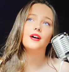 My Quaker parrot " Poncho" enjoying Lucy & Martha's beautiful voices, after  a week of training he can sing the first four words of this song, Many  Nights we've Prayed.