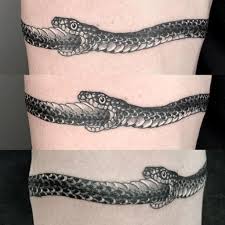 A snake tattoo is one of the coolest and most badass designs out there. Ouroboros Ouroborostattoo Tattoo Melbournetattoo Melbourne Snake Snaketattoo Blackwork Black Black Ouroboros Tattoo Small Snake Tattoo Circle Tattoos