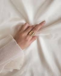 Golden Accessories And Silk Fabric Gold Statement Ring Statement Rings Jewelry Photoshoot