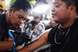 LOOK: More than a hundred tattoo artists converge at Barangay Canduman  Housing Gym in Mandaue City, Cebu to join the 2nd INK CITY On-The-Spot  Tattoo Competition