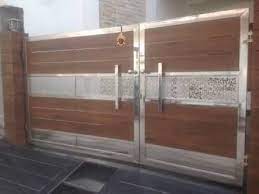 Wood steel main gate design. Image Result For Fundermax Door Wooden Gate Designs Gate House Doors