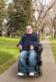 Some people just pass me by as if they don't see me. Disabled Man Using His Powered Wheelchair In A Park In Autumn Edmonton Alberta Canada Stock Photo Dissolve