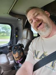 Henry is enjoying the van ride.