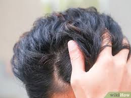 Doing a hot oil treatment is easy, simply warm up one of your favourite hair oils (argan, avocado, coconut, olive or almond among others) in a jar thrown into hot water. How To Take Care Of Natural Hair With Pictures Wikihow