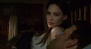 After death threats to his wife, they are taken into protective custody. False Witness 2009