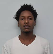 Man deported from Grenada charged with murder