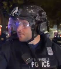 I believe this unmarked officer (71), accosting people in this video from  last night, is Nicholas M. Bianchini. Bianchini was also involved in a  police shooting last year, when an officer shot