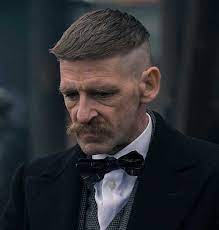Ask for an undercut crop with the sides of you hair shaved to a zero and a short crop on top just long enough to style it to the side but not sweeping like tommy's. Peaky Blinders Haircuts For Inspiration The Definitive Guide Hairmanz