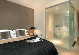 Glass Partition Wall Design Ideas And Room Dividers Separating Modern Bedrooms From Bathrooms Ensuite Bathroom Designs Bathroom Renovation Trends Hotel Room Design