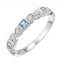 Who says diamonds are a girl's best friend? 10k White Gold Diamond And Square Blue Topaz Birthstone Ring Mullen Brothers