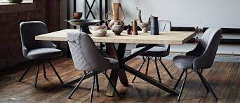 Two customizable industrial metal and wood dining room table bases. The Industrial Furniture Collection Urban Living And Dining Furniture Village