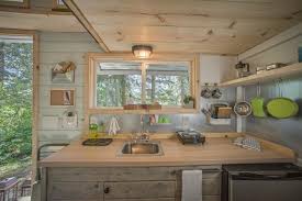 Here are thirteen types of storage you could use in your kitchen instead of regular kitchen cabinets. 9 Teeny Tiny Kitchens Packed With Character Hgtv S Decorating Design Blog Hgtv