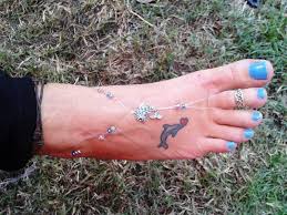 Memorial heart tattoo on foot. 19 Outstanding Dolphin Tattoos On Foot