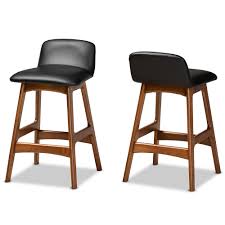 Idris charcoal black counter stool. Baxton Studio Darrin Mid Century Modern Black Faux Leather Upholstered And Walnut Brown Finished Wood 2 Piece Counter Stool Set Interior Express