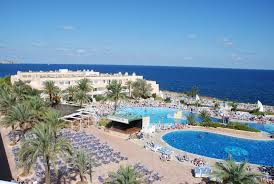 Situated Overlooking The Sea In An Incomparable Position At The Far End Of The San Antonio Bay The Four St San Antonio Bay Mediterranean Design The Good Place