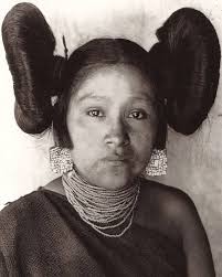 Hopi tribe's traditional squash blossom whorl hairstyle