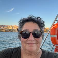 A rare photograph of Willie Moretti , former underboss of the old Luciano  Family under Frank Costello's reign. He's pictured relaxing and absorbing  sunshine as he watched the pure white swans on