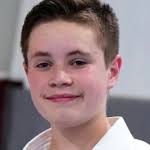 Youngest female to achieve black belt at Huard's Martial Arts Dojo