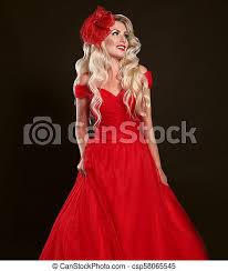 Best prom dress hues for your hair. Blonde Woman In Red Dress And Elegant Hat Isolated On Studio Black Background Beautiful Blond Girk With Long Wavy Hair And Canstock
