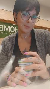 Can someone remove the screen glare from my self-portrait photo?