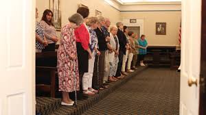 Catholic parishioners who spent 11 years occupying a closed church find a  new home — inside a temple