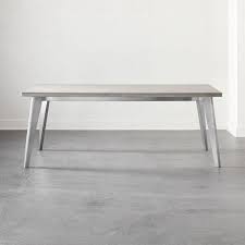 Complete your dining room or kitchen with a modern dining table. Harper Concrete Top Nickel Dining Table