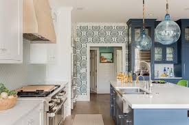Take a look at these diy kitchen island ideas and find out how to build your own. Blue Glass Lanterns With Blue Island Transitional Kitchen
