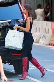 Emily ratajkowski posted a photo in a suit from her inamorata line, which she matched with white sock boots. Emily Ratajkowski Rocks Black Skin Tight Jumpsuit And Red Snakeskin Boots While Picking Up Lunch In New York City 110919 4