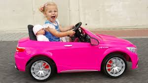 Features include real opening doors, working lights, and functioning horn. Little Girl Elis Ride On Pink Mercedes Benz Amg 12v Power Wheel With Baby Doll And Thomas Bmw Youtube