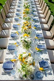 A table set for an outdoor dinner party. 95th Birthday Celebration Blue And White Dinner Table Blue Table Settings Dinner Table Setting Dinner Party Table