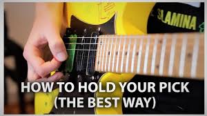 Many beginners instinctively hold the pick. How To Hold A Guitar Pick Properly Tutorial For Beginners Techatron Net