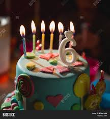 Dolce servito per festeggiare un compleanno (it); Birthday Cake Burning Image Photo Free Trial Bigstock