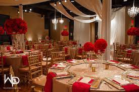 Beautiful gold place settings on wedding. Red And Gold Wedding At Wo Music School Red Gold Wedding Decorations Red Wedding Theme Red Gold Wedding