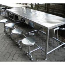 Compared to the usual table and chair configuration, a dining table with bench seating seems a bit odd and unusual. Ss Dining Table Dining Table Stainless Steel Dining Table Metal Dining Latest Price And Manufacture Supplier In India