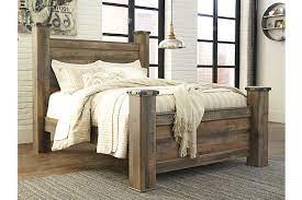 In any bedroom, this bed has great modern farmhouse character for your living area. Trinell Queen Poster Bed Ashley Furniture Homestore