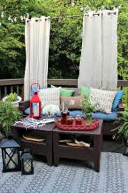 Diy summer decorating with outdoor curtain fabrics garden bench with pink canopy made of outdoor curtain fabric, romantic summer decorating ideas outdoor curtains is an inexpensive way to add a little privacy to your porch, gazebo or patio designs. Diy Floating Outdoor Curtain Rod Creating A Privacy Curtains For Deck
