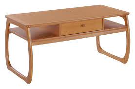 Providing ample storage for books. Nathan Classic Teak Burlington Coffee Table Coffee Tables Hafren Furnishers