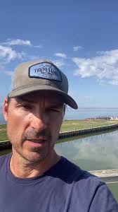 Today, I fished with Captain David Dillman and one of my longtime friends,  Chris Schmid and his son Clayton. We struggled early with strong wind and a  rain storm delay but we