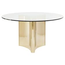 Pedistal table pedestal table base wood pedestal round table top rectangle table square our quatrefoil small table lamp features ornate details like a honeyed gold patterned base and a striped. Ellen Modern Sleek Gold Round Glass Top Dining Table In 2021 Metal Round Dining Table Metal Dining Table Glass Dining Table