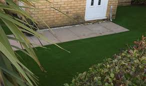 how to stop artificial grass sinking