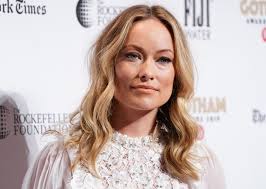 Getting serious? Olivia Wilde hauls suitcases over to Harry Styles' home